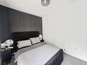 Bedroom One- click for photo gallery